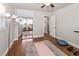Light filled bedroom with mirrored closet doors and doorway leading to other rooms in the house at 6235 17Th N Ave, St Petersburg, FL 33710