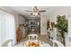 Bright dining space showcasing wood-look tile, modern furnishings, and kitchen access at 6235 17Th N Ave, St Petersburg, FL 33710
