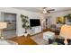 View of the living room, kitchen, and dining room from the home's entryway at 6235 17Th N Ave, St Petersburg, FL 33710