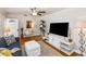 Comfortable living room with hardwood floors, neutral colors, and a ceiling fan at 6235 17Th N Ave, St Petersburg, FL 33710