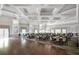 Elegant ballroom with hardwood floor, recessed ceiling, chandelier lighting, and tables with chairs at 6315 43Rd E Ct, Sarasota, FL 34243