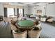 Community game room featuring poker tables and seating for residents' entertainment at 6315 43Rd E Ct, Sarasota, FL 34243