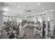 Well-equipped gym with modern machines, rubber floor, and ceiling fans offers residents a convenient fitness space at 6315 43Rd E Ct, Sarasota, FL 34243