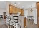 Charming kitchen features granite counters, breakfast bar, and adjacent dining area at 6315 43Rd E Ct, Sarasota, FL 34243