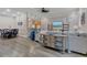 Open concept living room with hardwood floors, comfortable seating, and modern decor at 6315 43Rd E Ct, Sarasota, FL 34243
