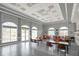 Generous meeting room offering abundant seating, tables, and large windows at 6315 43Rd E Ct, Sarasota, FL 34243