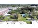 The aerial shot captures a mobile home park and mature trees at 6673 146Th N Ave, Clearwater, FL 33764
