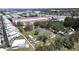 Expansive lot featuring several structures and mature trees, all contained within a defined property line at 6673 146Th N Ave, Clearwater, FL 33764