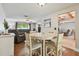 Dining area adjacent to living room and kitchen at 6903 Cedar Ridge N Dr, Pinellas Park, FL 33781