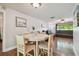 Open concept dining area with views to the living room at 6903 Cedar Ridge N Dr, Pinellas Park, FL 33781