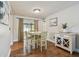 Inviting dining area with hardwood floors and natural lighting at 6903 Cedar Ridge N Dr, Pinellas Park, FL 33781