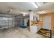 Spacious garage with automatic door, ample storage, and plenty of workspace at 6903 Cedar Ridge N Dr, Pinellas Park, FL 33781