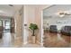 Inviting living room showcasing hardwood floors, neutral tones, and comfortable seating, creating a welcoming atmosphere at 6903 Cedar Ridge N Dr, Pinellas Park, FL 33781