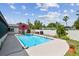Enjoy this lovely pool and patio area, with deck and plenty of privacy in this backyard retreat at 6903 Cedar Ridge N Dr, Pinellas Park, FL 33781