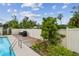 Beautiful pool area with a deck and landscaping providing privacy and space to relax at 6903 Cedar Ridge N Dr, Pinellas Park, FL 33781