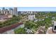An aerial view of the downtown area, showcasing modern buildings and lush greenery surrounding the property at 700 Beach Ne Dr # 704, St Petersburg, FL 33701