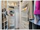 Organized closet with shelving and drawers, maximizing storage space for clothes and accessories at 700 Beach Ne Dr # 704, St Petersburg, FL 33701