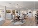 Inviting dining room with sleek track lighting and views into a modern, updated kitchen at 700 Beach Ne Dr # 704, St Petersburg, FL 33701