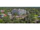 A beautiful residential building is surrounded by lush greenery, enhancing the property's appeal and serenity at 700 Beach Ne Dr # 704, St Petersburg, FL 33701