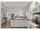 Open concept kitchen with views of the dining and living areas at 700 Beach Ne Dr # 704, St Petersburg, FL 33701