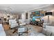 Spacious living room with a view to the dining room, hardwood floors and stylish decor at 700 Beach Ne Dr # 704, St Petersburg, FL 33701