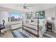 Bright bedroom with large windows and views of the city and water at 700 Beach Ne Dr # 704, St Petersburg, FL 33701