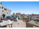 Rooftop deck with a seating area overlooking the city skyline and ocean view at 700 Beach Ne Dr # 704, St Petersburg, FL 33701
