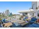 Rooftop deck with ample seating areas and clear views of the city skyline at 700 Beach Ne Dr # 704, St Petersburg, FL 33701