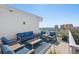 Rooftop deck featuring comfortable seating and a beautiful view of the surrounding city and ocean at 700 Beach Ne Dr # 704, St Petersburg, FL 33701
