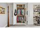 Spacious walk-in closet with custom shelving and ample storage space at 700 Beach Ne Dr # 704, St Petersburg, FL 33701