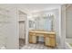 Functional bathroom featuring dual sinks, generous vanity space, and ample storage at 7035 Drury St, Tampa, FL 33635