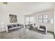 Cozy living room featuring comfortable seating, modern decor, and ample natural light at 7035 Drury St, Tampa, FL 33635