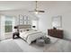 Inviting main bedroom featuring a spacious layout, a ceiling fan and natural lighting at 7035 Drury St, Tampa, FL 33635