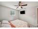 Bedroom with natural light and wood-look flooring at 8497 Portulaca Ave, Seminole, FL 33777