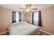 Light and airy bedroom with fan and window at 8497 Portulaca Ave, Seminole, FL 33777