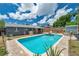 Backyard featuring an in-ground pool at 8497 Portulaca Ave, Seminole, FL 33777
