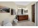 Bathroom featuring a double sink vanity, bidet, and walk-in shower at 8562 Acorn Ridge Ct, Tampa, FL 33625