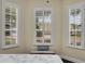 This bedroom features shuttered windows providing natural light at 8562 Acorn Ridge Ct, Tampa, FL 33625