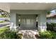 Exterior view of mailboxes in neighborhood featuring well-maintained landscaping at 8562 Acorn Ridge Ct, Tampa, FL 33625