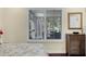 Main bedroom with shuttered windows and hardwood floors at 8562 Acorn Ridge Ct, Tampa, FL 33625