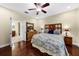 Well-lit main bedroom features a walk-in closet and en-suite bathroom at 8562 Acorn Ridge Ct, Tampa, FL 33625