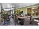 Inviting screened porch with dining and seating areas, great for entertaining or enjoying nature at 8562 Acorn Ridge Ct, Tampa, FL 33625