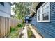 Fenced yard area between homes offers privacy and potential for outdoor enjoyment at 902 W Columbus Dr, Tampa, FL 33602
