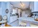 Modern kitchen featuring white cabinets, granite countertops, and stainless steel appliances at 902 W Columbus Dr, Tampa, FL 33602