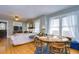 Bright living room and dining area showcasing wood floors and abundant natural light at 902 W Columbus Dr, Tampa, FL 33602