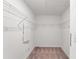 Walk-in closet with wire shelving for storage, offering functionality and organization at 937 Royal Empress Dr, Ruskin, FL 33570