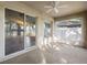 Covered patio with ceiling fan overlooking the backyard at 9479 Southern Charm Cir, Brooksville, FL 34613