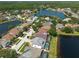 An aerial shot displaying a large community lake at 10522 Sky Flower Ct, Land O Lakes, FL 34638