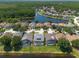 Beautiful homes line the lake in this aerial view of the community at 10522 Sky Flower Ct, Land O Lakes, FL 34638