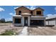 Unfinished two-story home with block construction and a two-car garage is ready for your personal touch at 10652 Crescent Creek Xing, Parrish, FL 34219